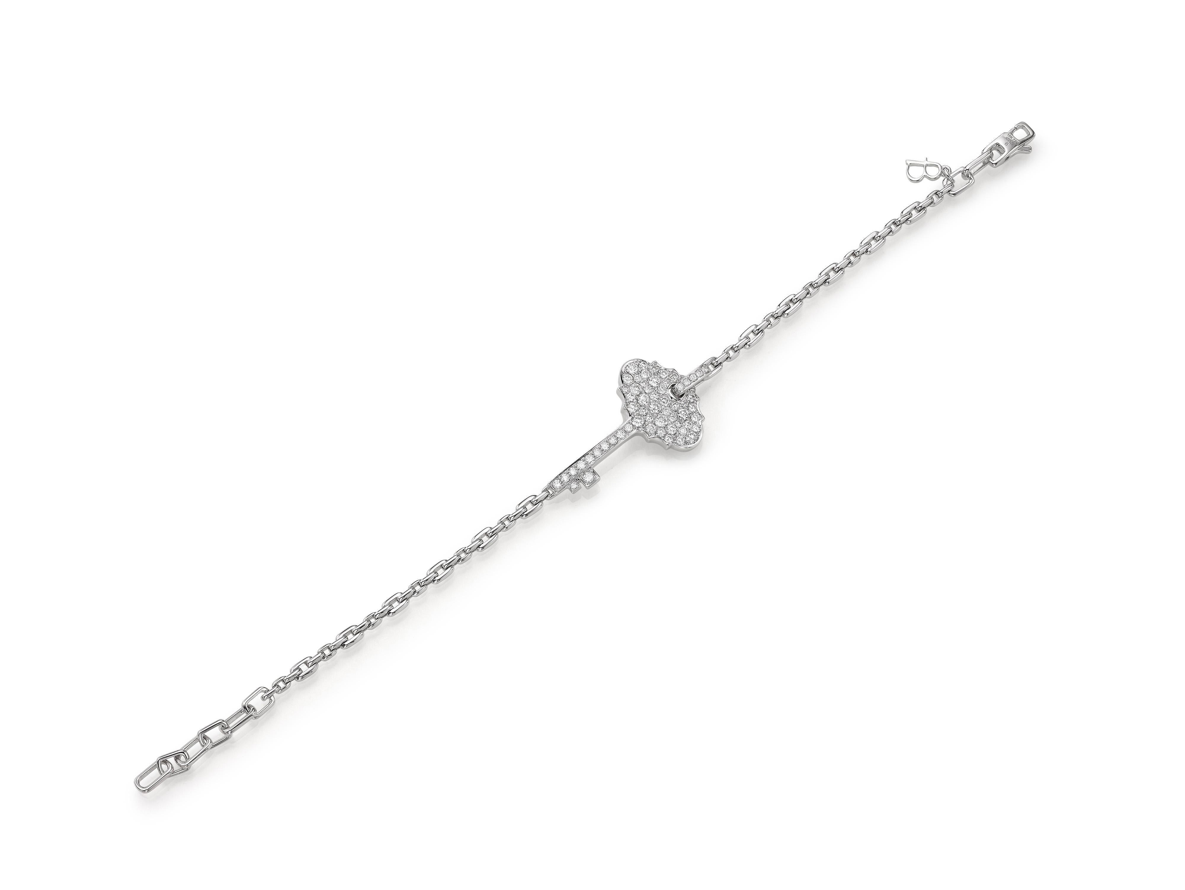 A simple, stackable bracelet that is perfect for every day.  Butani’s 18K white gold bracelet is strung with a key pendant and encrusted with diamonds totaling 0.89 carats.  Adjustable to your preferred length.  Also available in yellow gold and