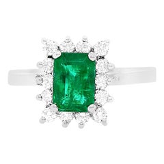 0.89 Carat Emerald Engagement Ring with Diamonds