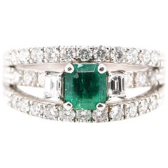 0.89 Carat Natural Emerald and Diamond Ring Set in Platinum