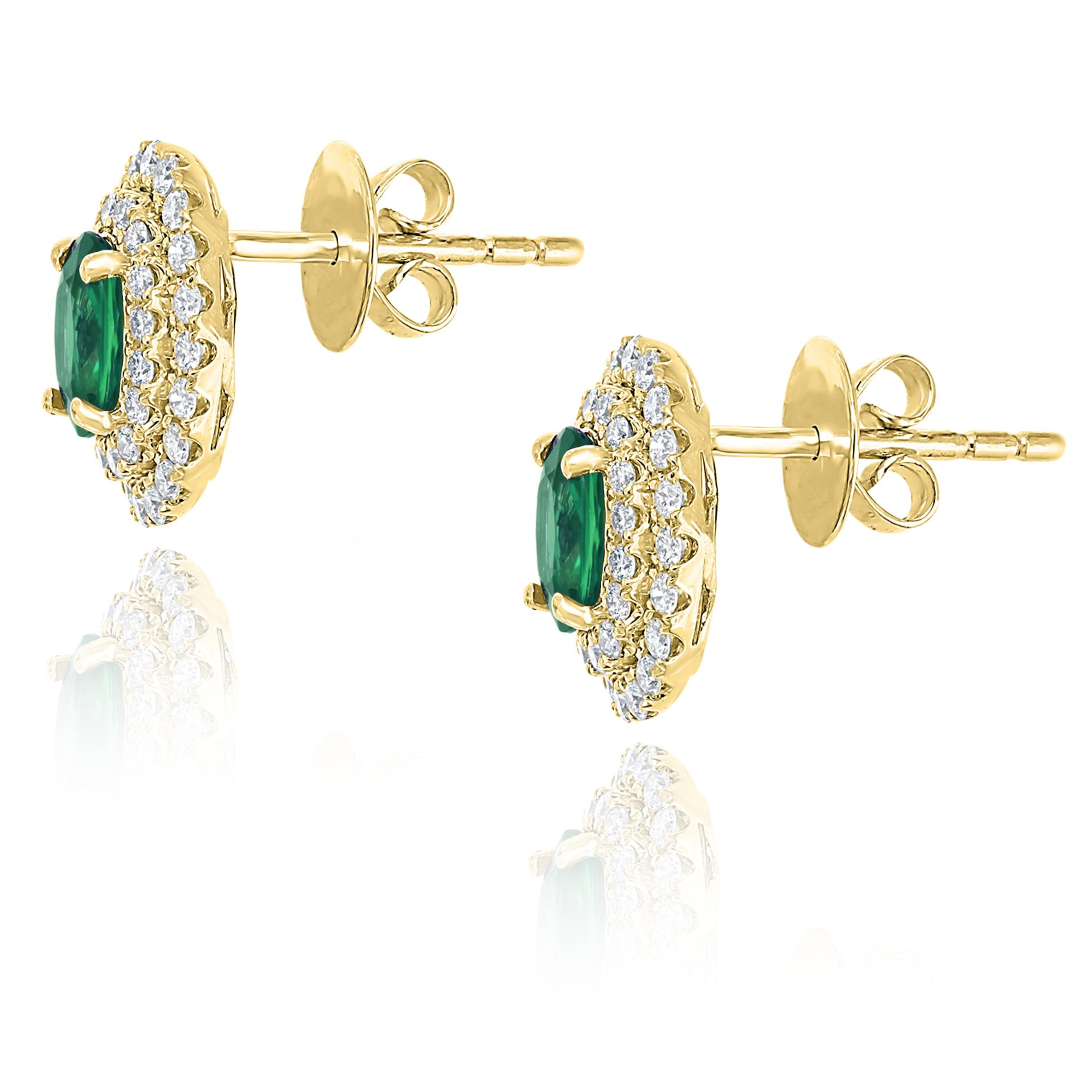 Contemporary 0.89 Carat Oval Cut Emerald and Diamond Stud Earrings in 18K Yellow Gold For Sale