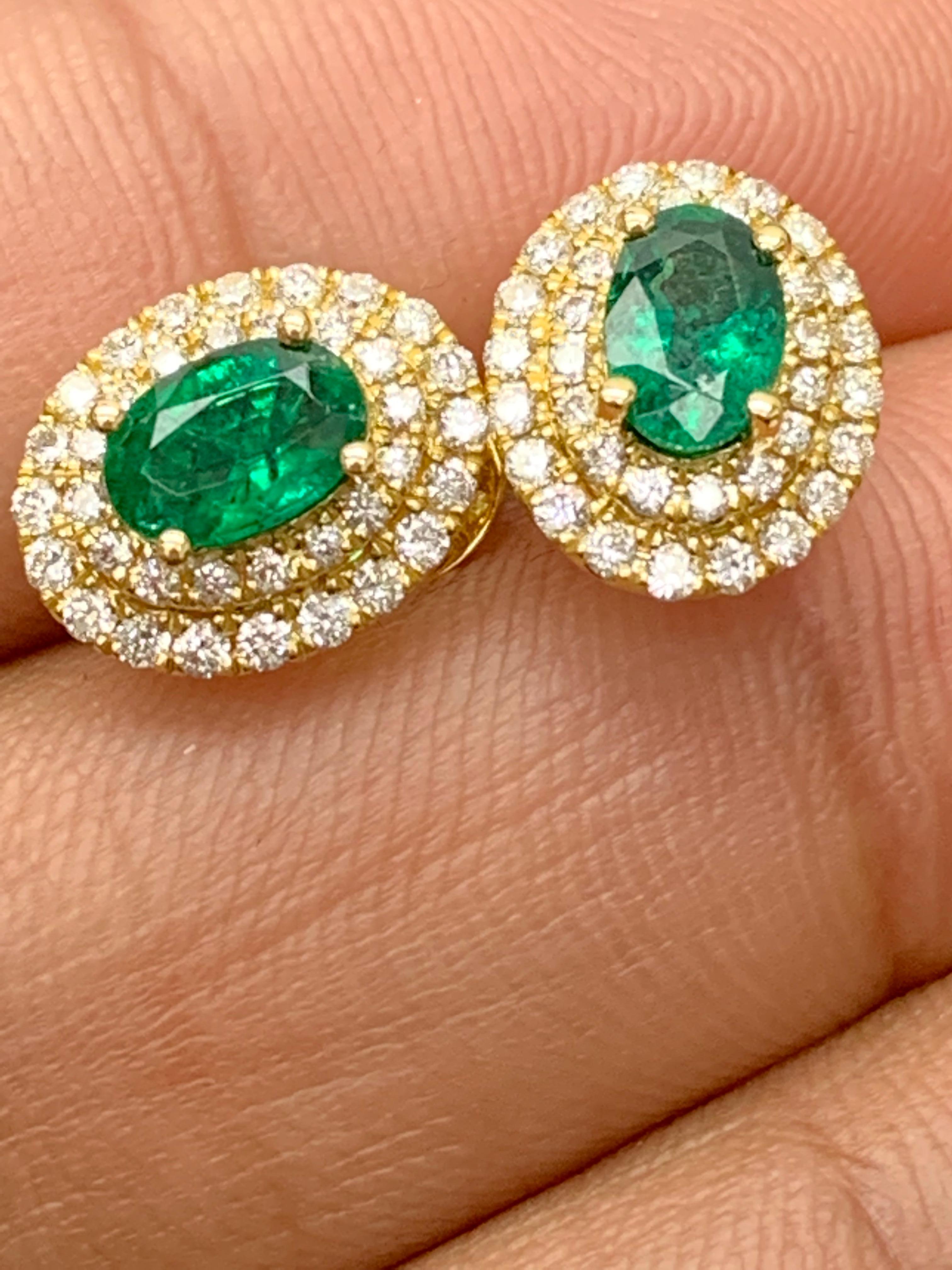 0.89 Carat Oval Cut Emerald and Diamond Stud Earrings in 18K Yellow Gold In New Condition For Sale In NEW YORK, NY