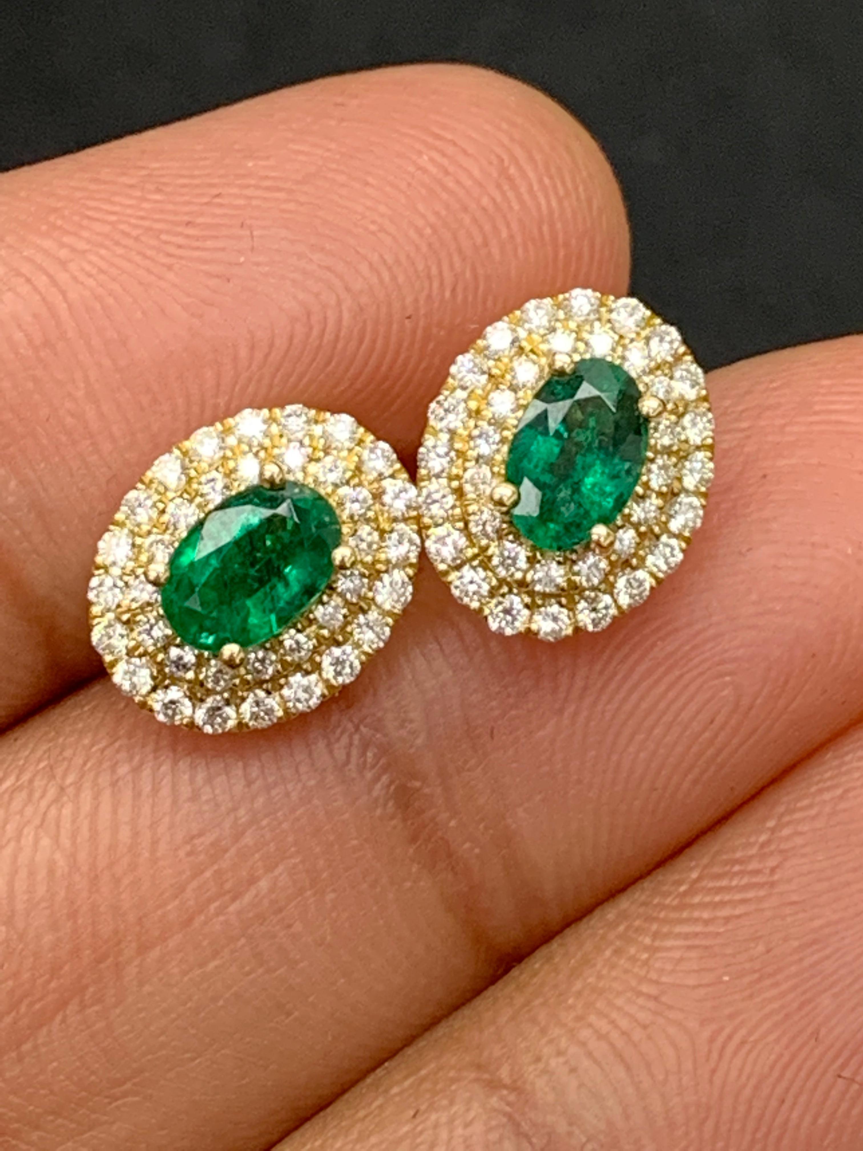 0.89 Carat Oval Cut Emerald and Diamond Stud Earrings in 18K Yellow Gold For Sale 1