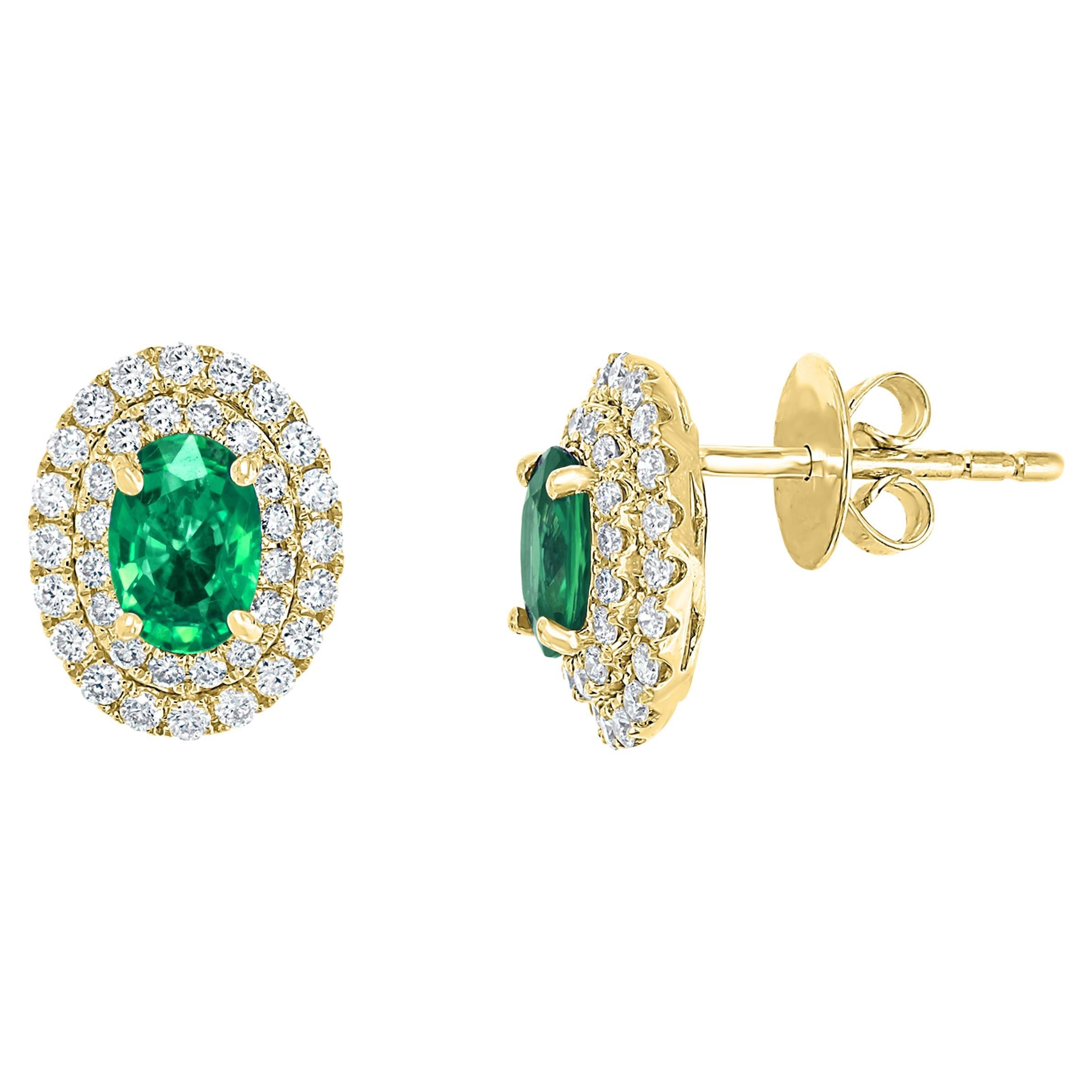 0.89 Carat Oval Cut Emerald and Diamond Stud Earrings in 18K Yellow Gold