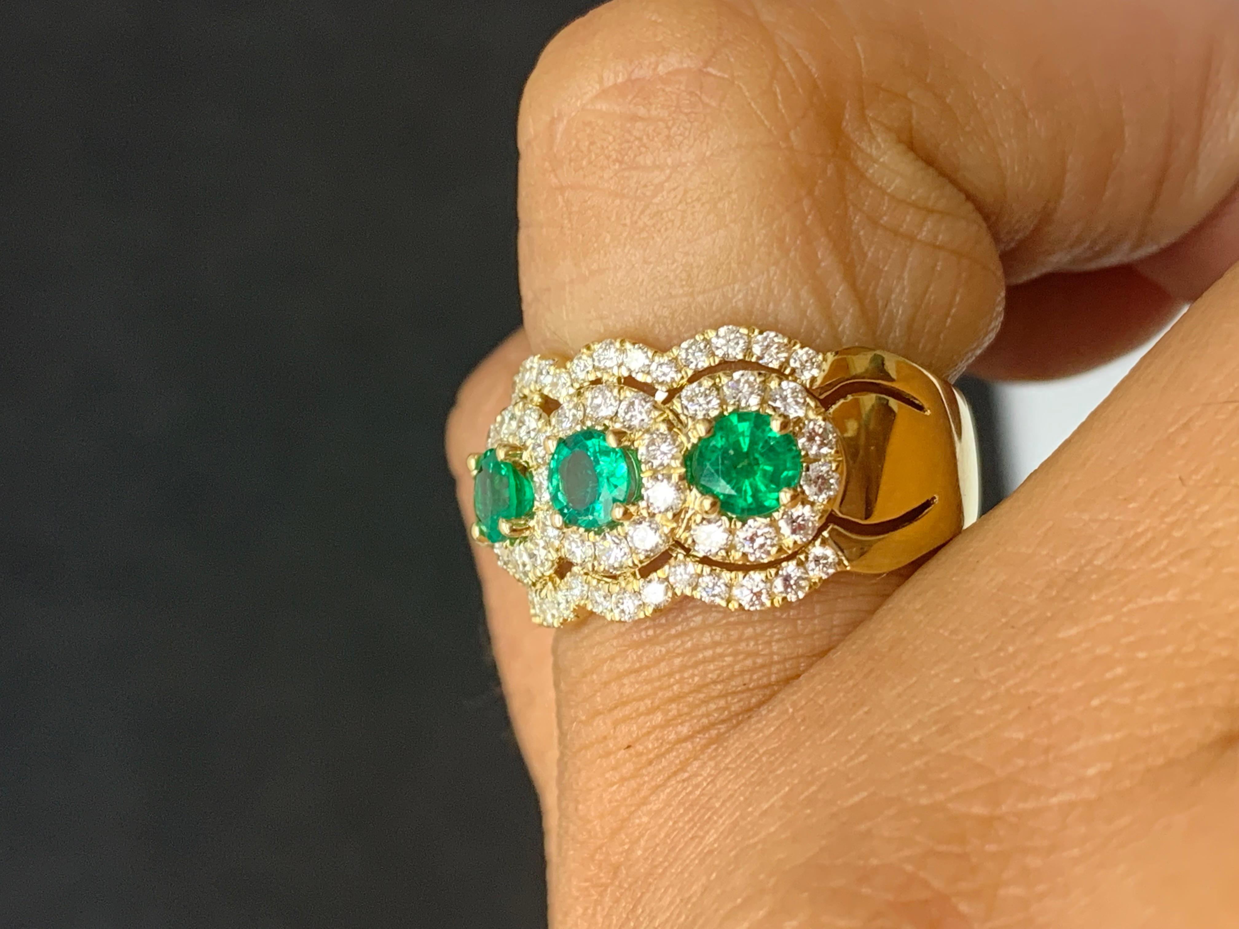 A magnificent and unique piece of jewelry showcasing fancy round cut 4 emeralds set in an open-work, floating diamond design made in 18K White gold. 4 Emeralds weigh 0.89 carats and 69 Diamonds weigh 1.01 carats in total. 

Size 6.5 US (Sizable).