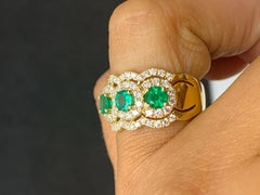 0.89 Carat Round Cut Emerald and Diamond 18K Yellow Gold Ring