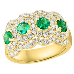 Used 0.89 Carat Round Cut Emerald and Diamond 18K Yellow Gold Ring