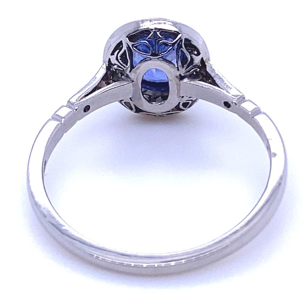 Women's 0.89 Carat Sapphire and Diamond Cluster Platinum Engagement Ring For Sale
