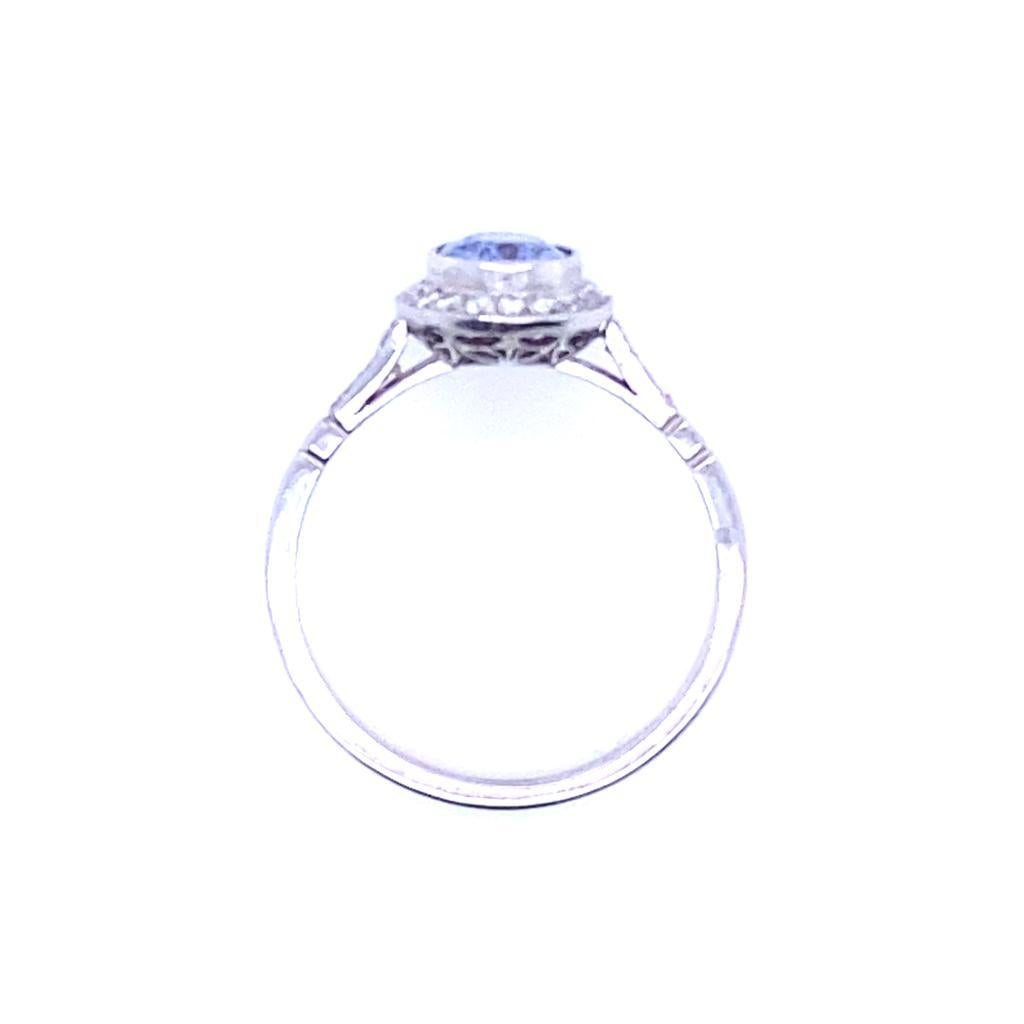 0.89 Carat Sapphire and Diamond Cluster Platinum Engagement Ring For Sale 1