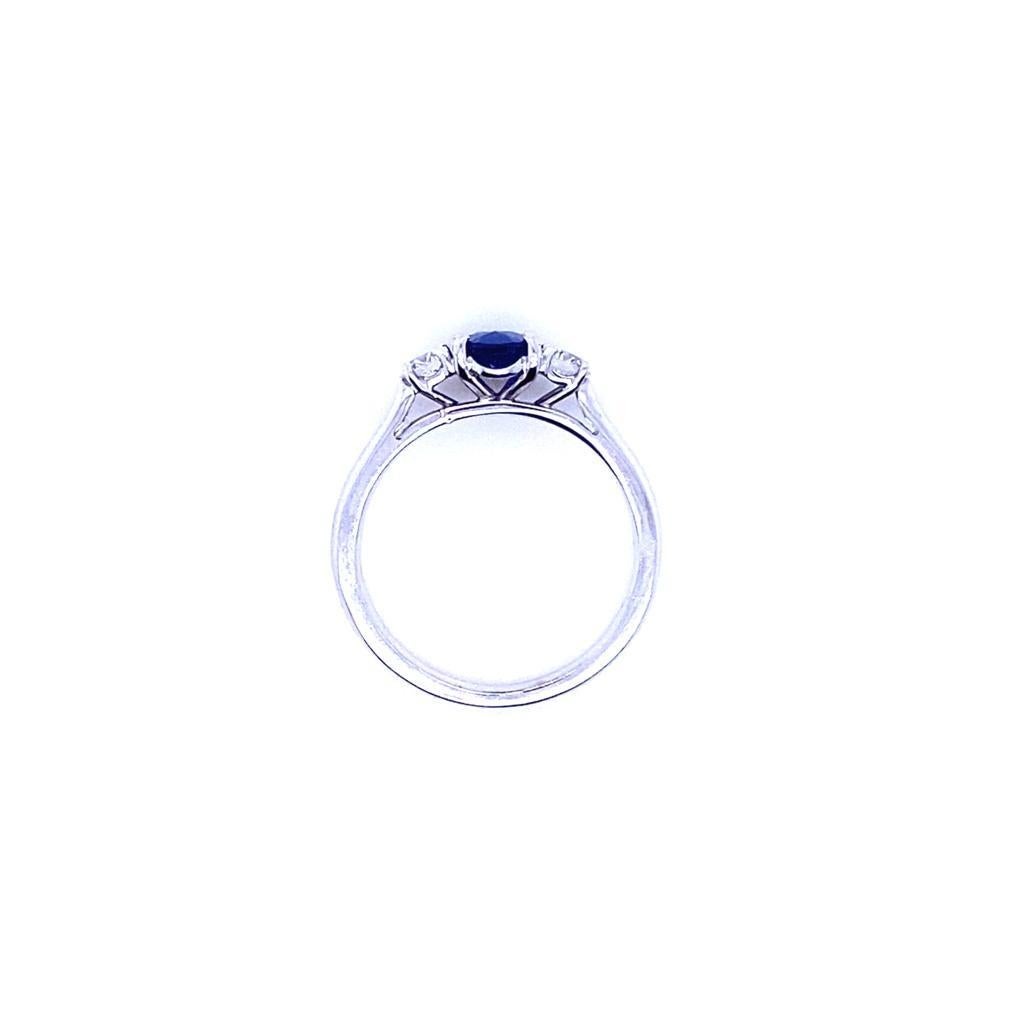 0.89 Carat Sapphire and Diamond Three Stone 18 Karat White Gold Engagement Ring In New Condition For Sale In London, GB