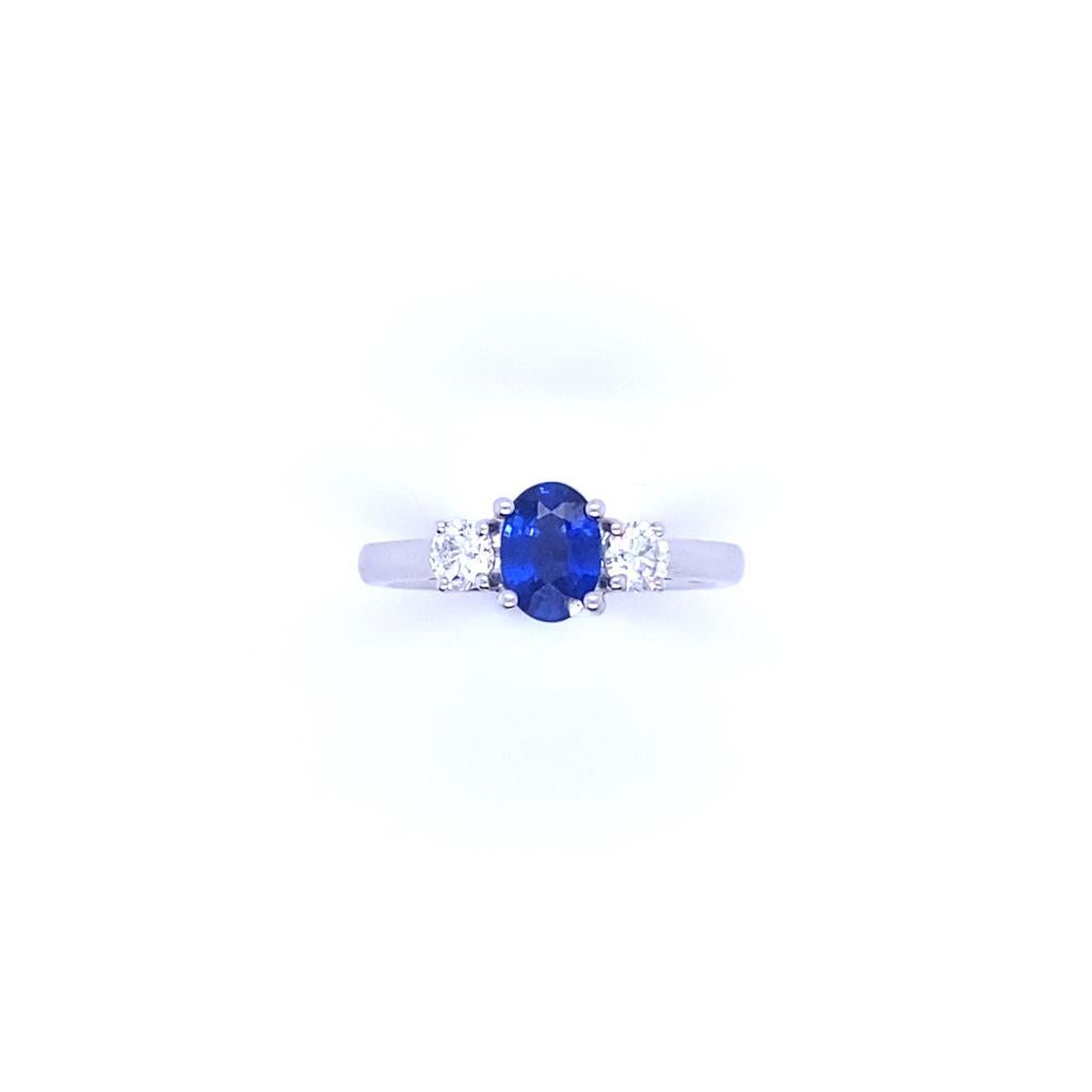 Women's 0.89 Carat Sapphire and Diamond Three Stone 18 Karat White Gold Engagement Ring For Sale