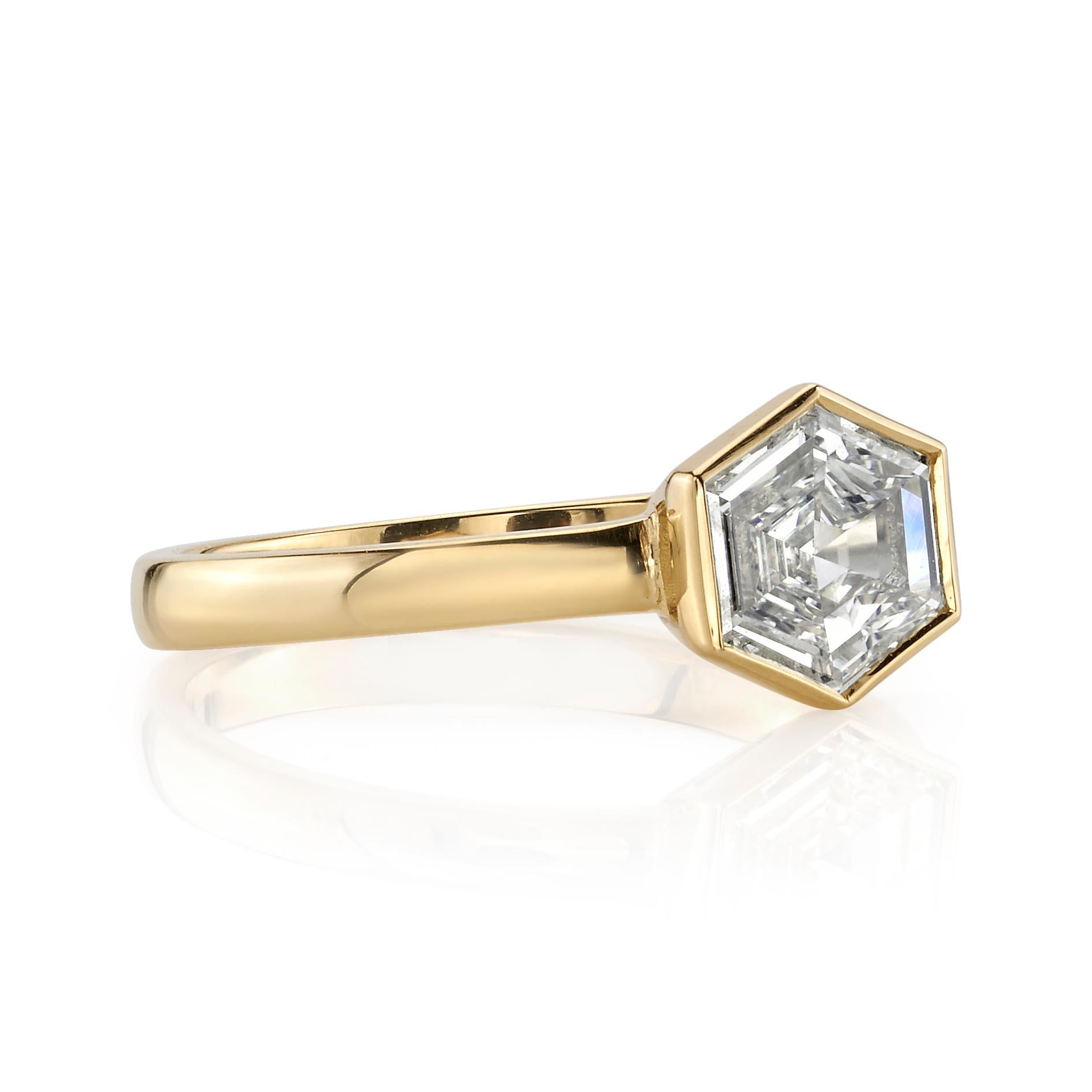 0.89ctw K/VVS1 GIA certified Hexagonal Step cut diamond set in a handcrafted 18K yellow gold mounting.

Ring is currently a size 6 and can be sized to fit.