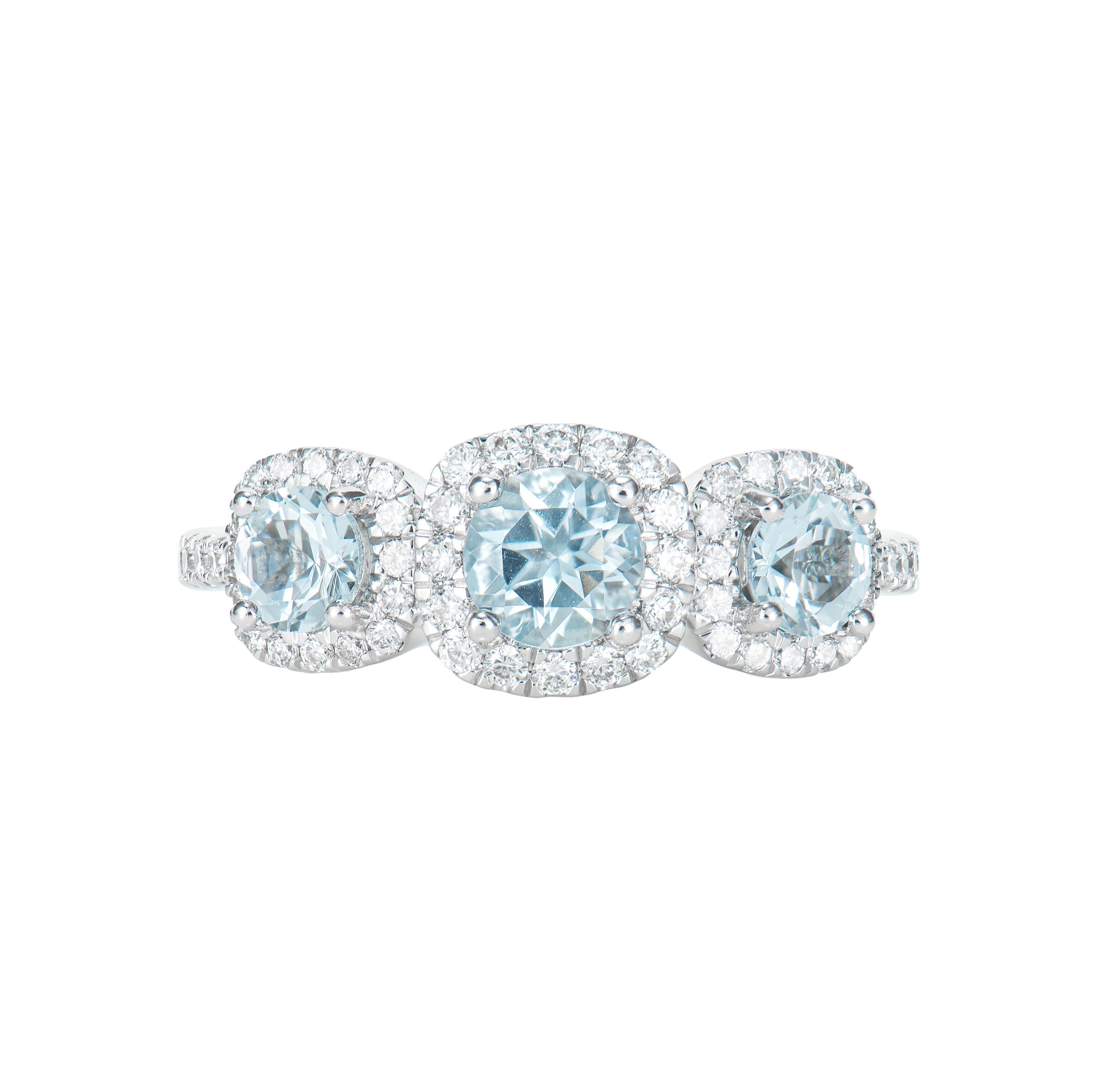 Contemporary 0.89 Carat Three Stone Aquamarine Solitaire Ring in 14KWG with White Diamond. For Sale