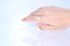 0.89 Carat Yellow Diamond with Round-Cut White Diamond 18k Yellow Gold Ring