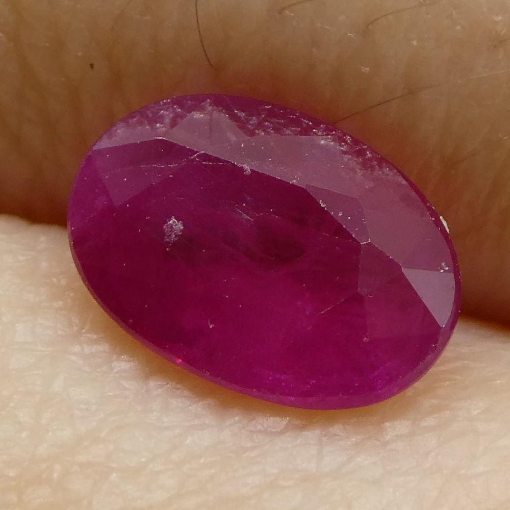 Description:

Gem Type: Ruby
Number of Stones: 1
Weight: 0.89 cts
Measurements: 7.02x4.94x2.62 mm
Shape: Oval
Cutting Style Crown: Modified Brilliant
Cutting Style Pavilion: Step Cut
Transparency: Transparent
Clarity: Moderately Included: Inclusions