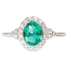 0,8ct Natürlicher Ovalschliff Smaragd & Diamant Halo Verlobungsring in 18k Weißgold