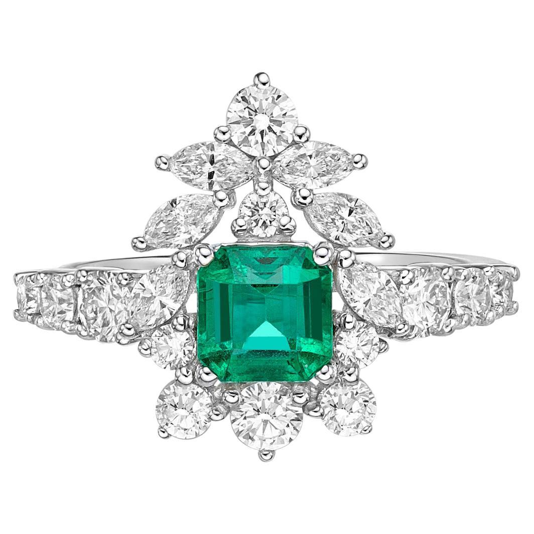 0.9 Carat Emerald and Diamond Ring in 18 Karat White Gold For Sale