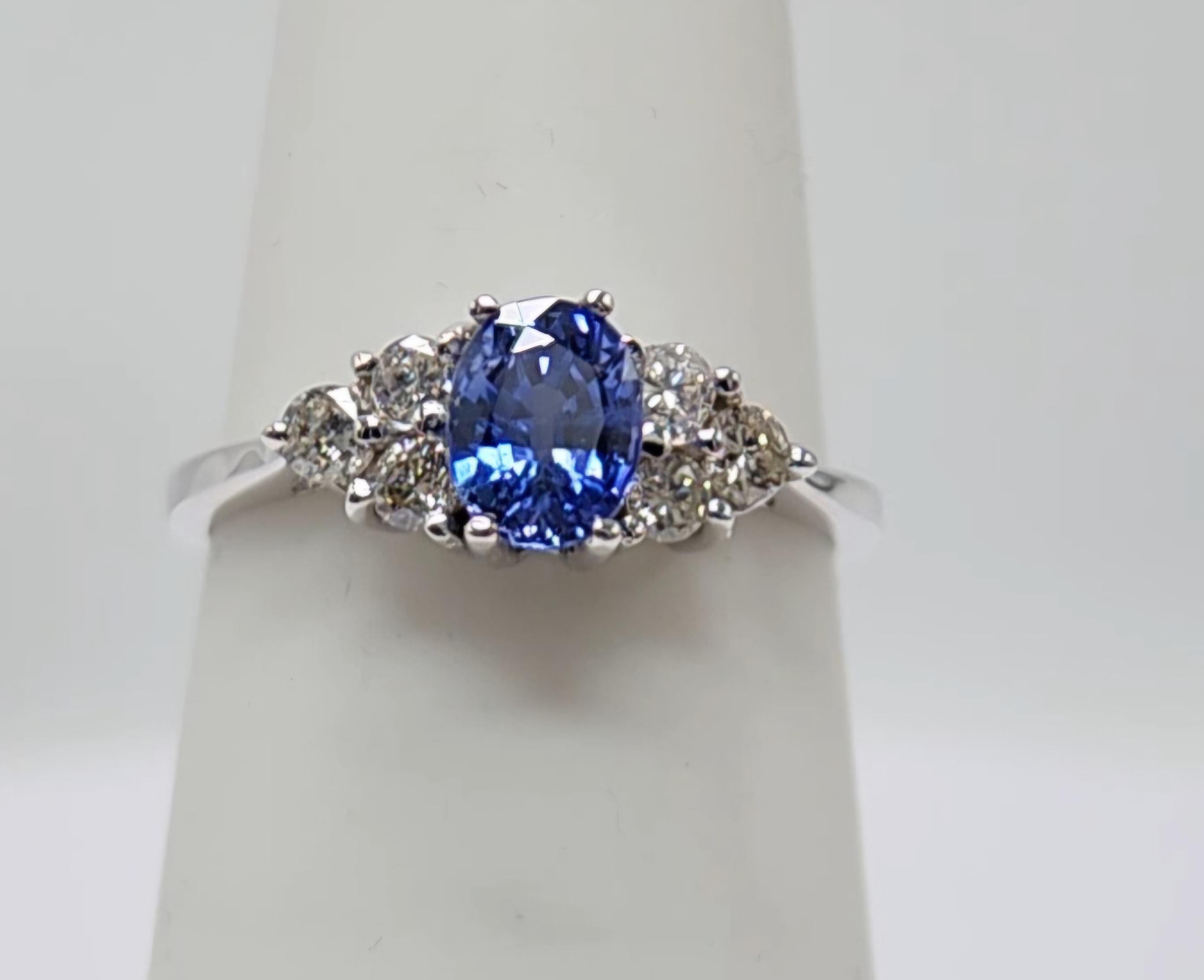 Oval Cut 0.90  Carat Blue Sapphire  Ring 14 Karat White Gold with Diamonds. For Sale