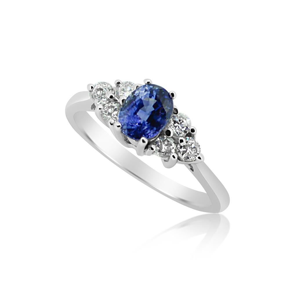 Round Sapphire  AAA brilliant deep Blue color 0.90 cts.
Total diamonds 0.40 carat G H-VS
14k White Gold 2.50 Grams, 
Finger Size 7
All stones are natural and none treated.