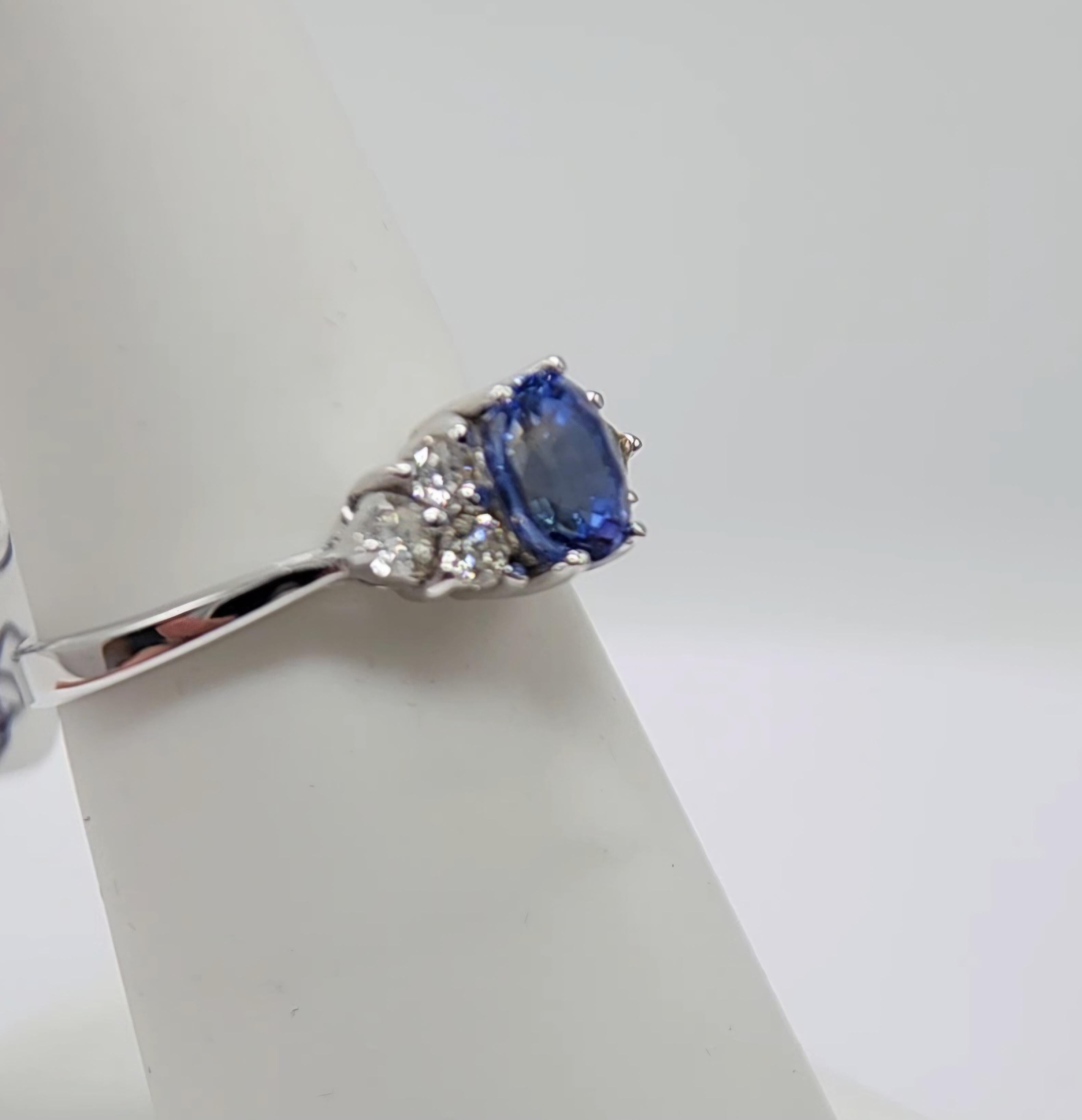 Women's 0.90  Carat Blue Sapphire  Ring 14 Karat White Gold with Diamonds. For Sale