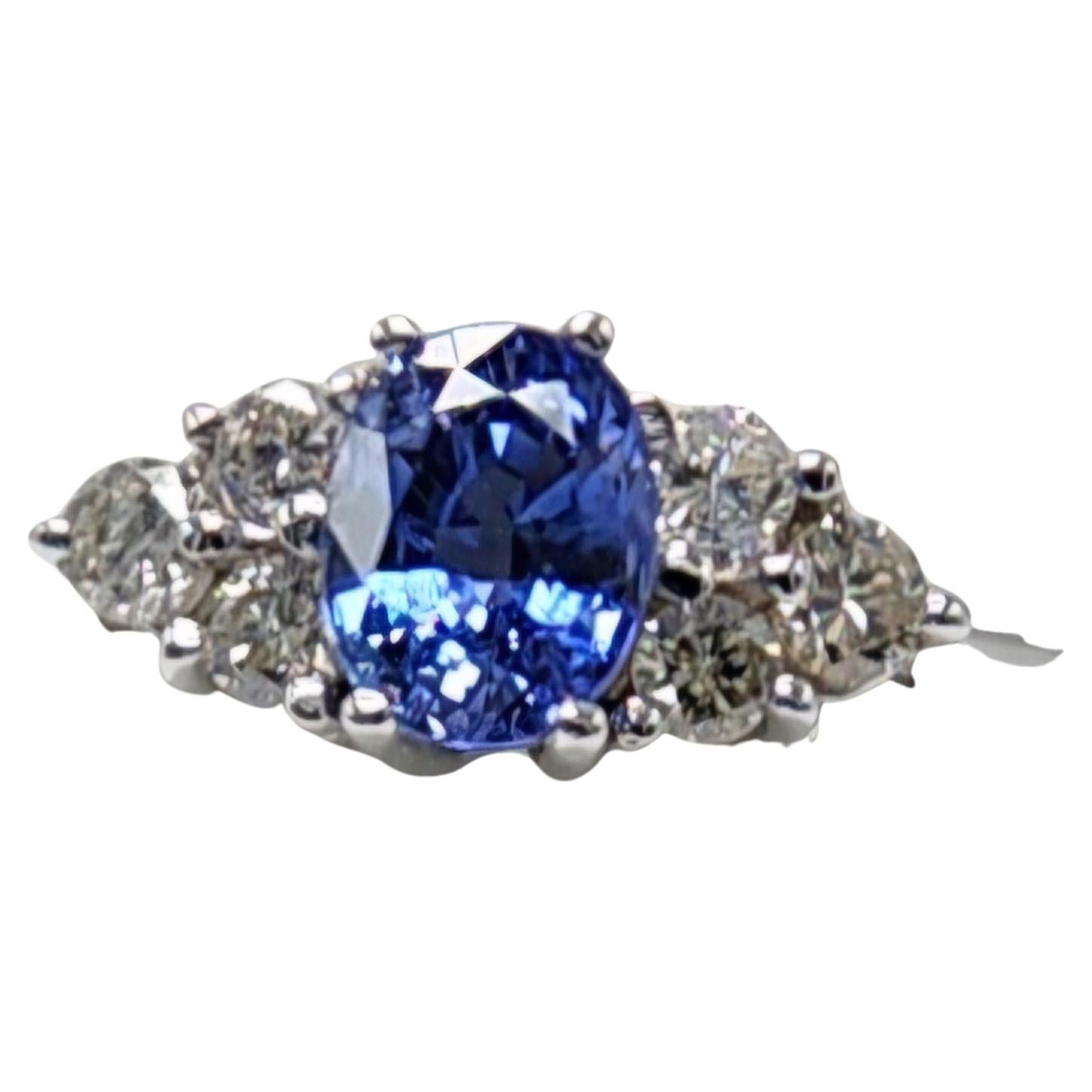 Artisan 0.90  Carat Blue Sapphire  Ring 14 Karat White Gold with Diamonds. For Sale