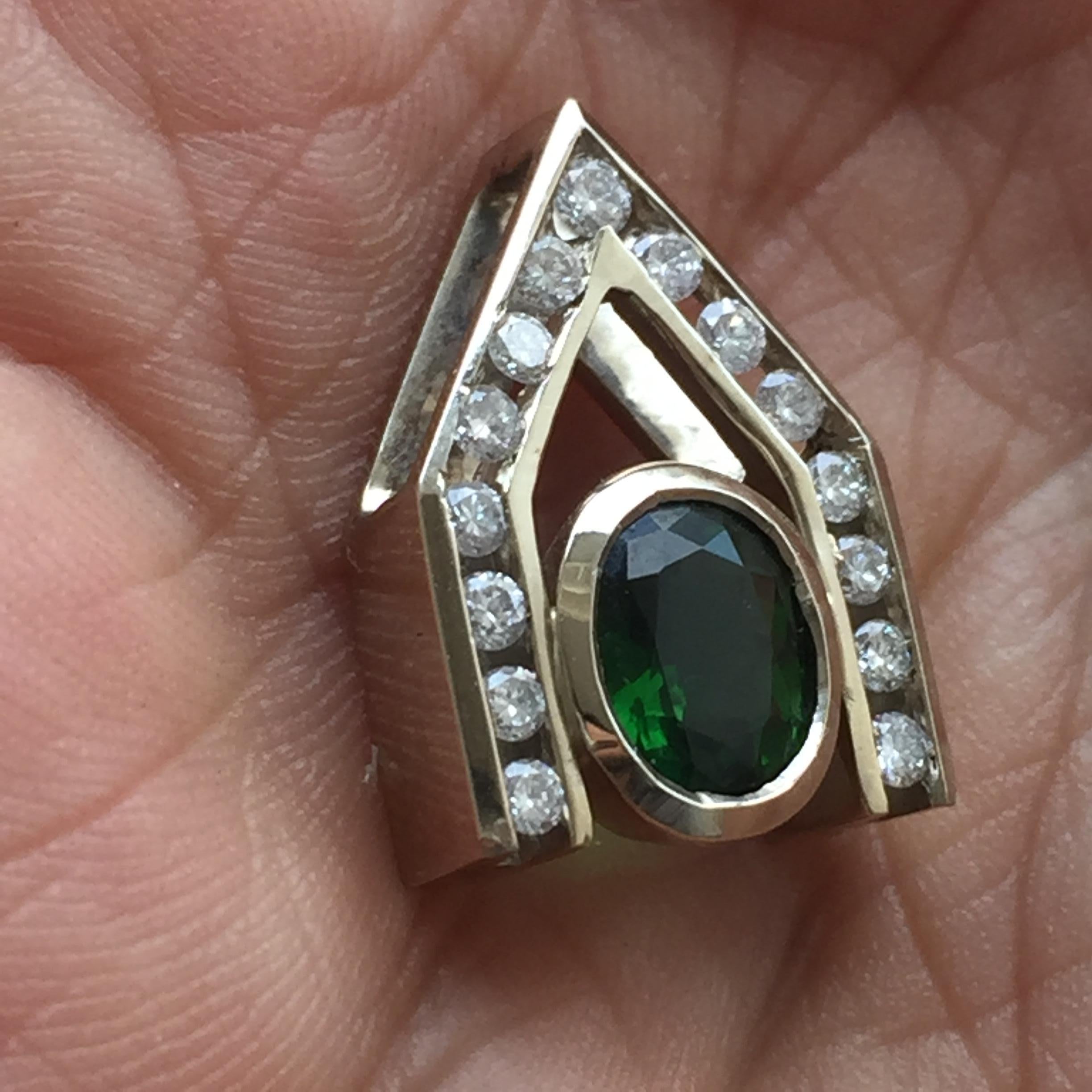 H718002
Ring may have to be made to order depending on finger size , please allow 3 to 6 weeks but if you have a sooner delivery date needed let us know and we will see if we can accommodate you.

0.90 Carat Chrome Tourmaline. Set in a hand designed