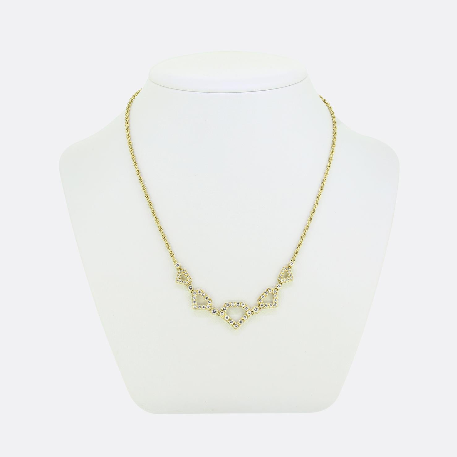 Here we have a wonderful necklace showcasing a modern geometric design. Crafted from a rich 18ct yellow gold, it features a series of open pentagonal shapes, each encrusted with bright white round brilliant-cut diamonds. The diamonds are