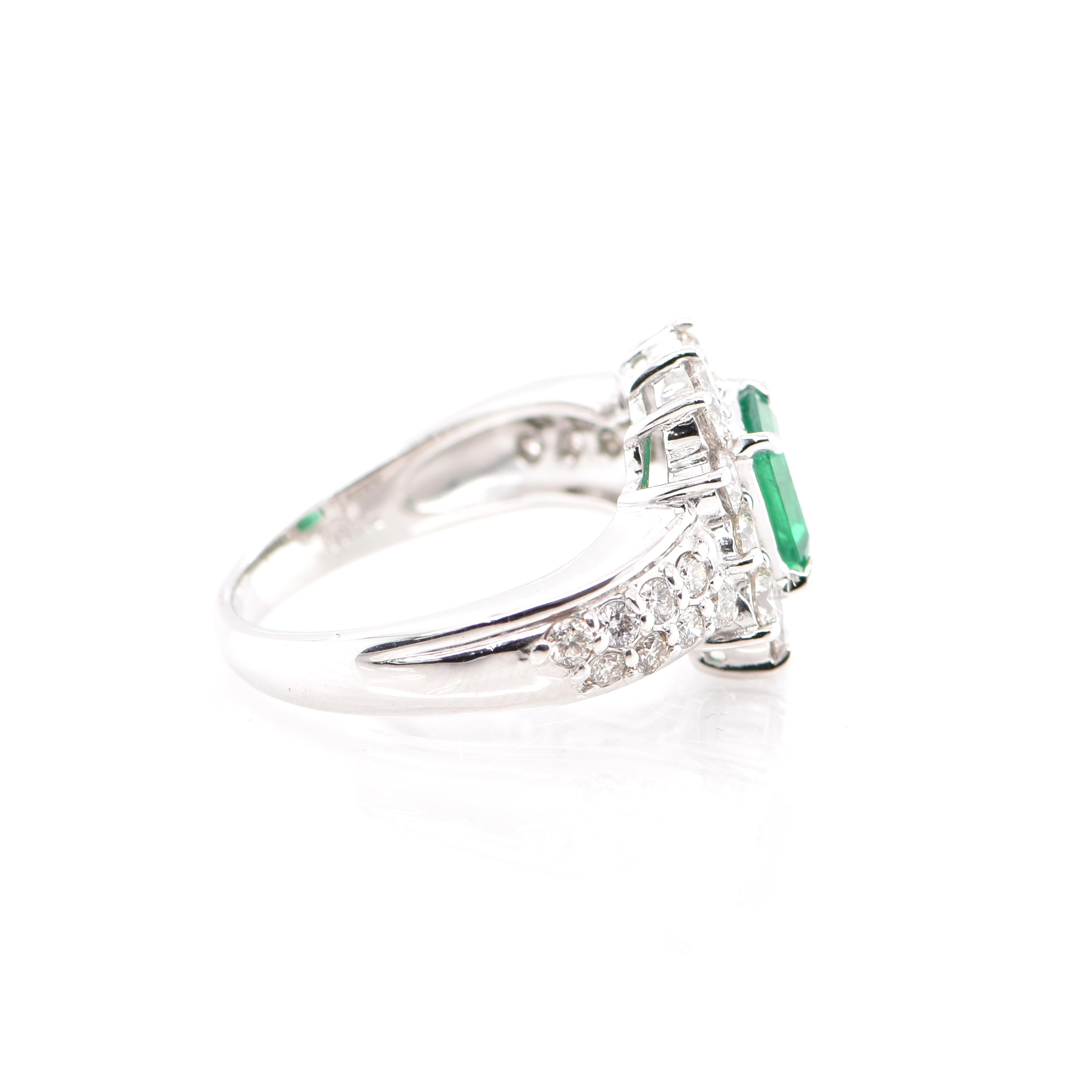 Women's 0.90 Carat Natural Vivid Green Emerald and Diamond Ring Set in Platinum For Sale