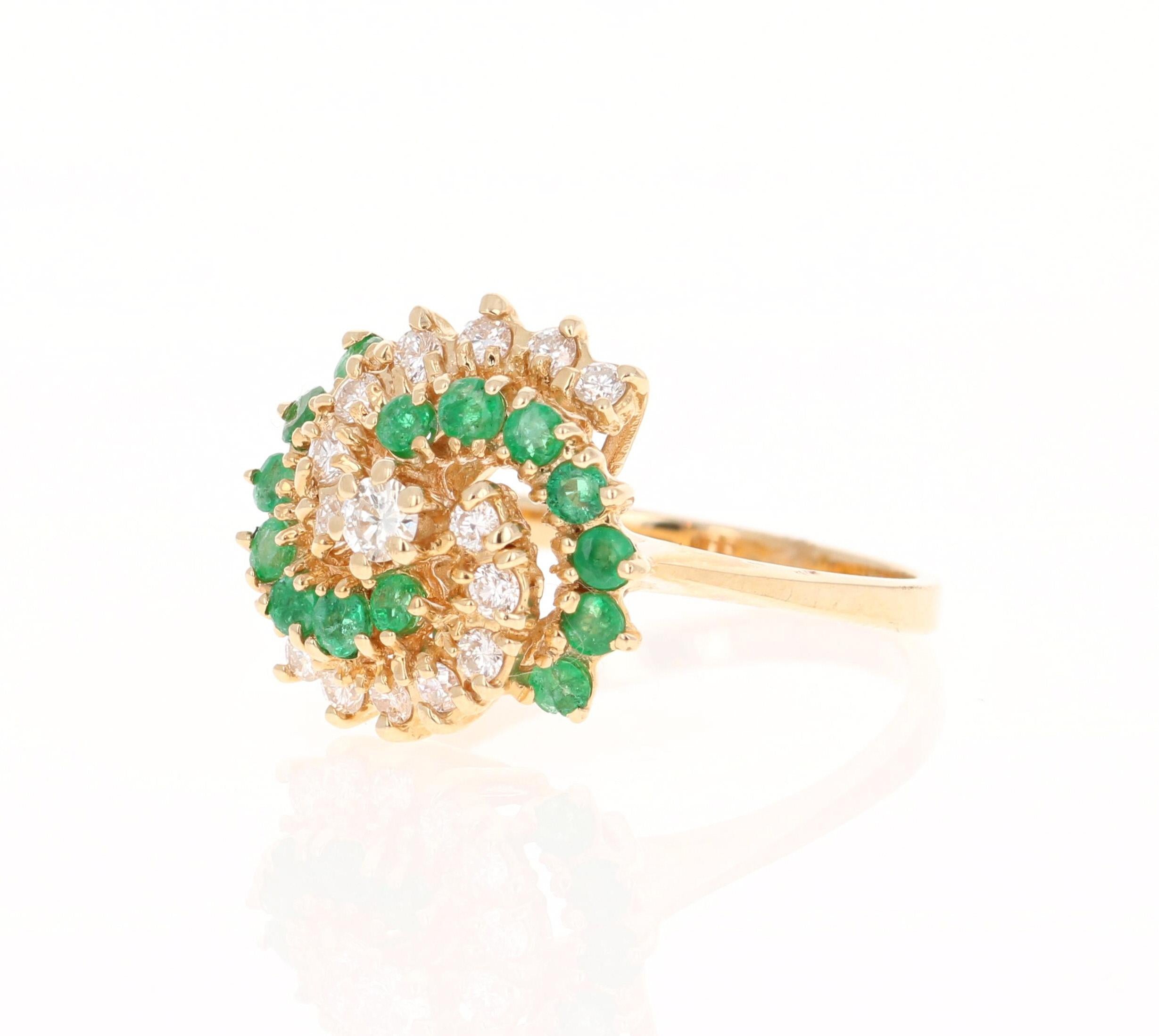 This ring has 14 Round Cut Natural Emeralds that weigh 0.40 carats and 15 Round Cut Natural Diamonds that weigh 0.50 carats. 
The Total Carat Weight of the ring is 0.90 Carats. It is set in 14K Yellow Gold and is 4.5 grams. 

The ring is a size 7