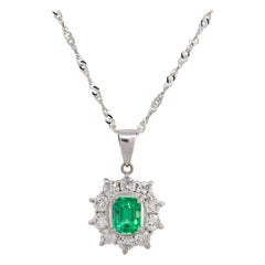 0.90 Carat Emerald Diamond Halo Pendant Necklace Platinum in Stock 0.90 Carat Emerald Diamond Halo Pendant Necklace Platinum in Stock