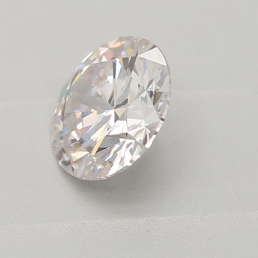 Round Cut 0.90 Carat Faint Pink Round cut diamond SI1 Clarity GIA Certified For Sale