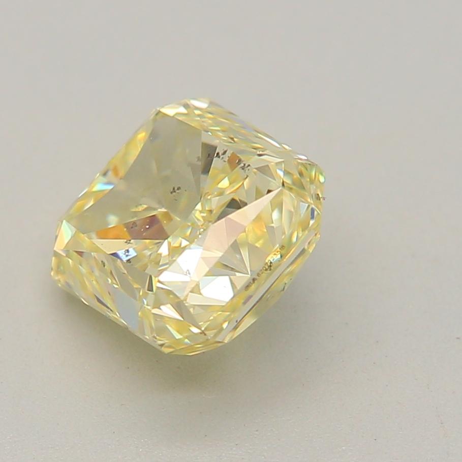 Radiant Cut 0.90 Carat Fancy Light Yellow Radiant cut diamond SI2 Clarity GIA Certified For Sale