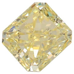 0.90 Carat Fancy Light Yellow Radiant cut diamond SI2 Clarity GIA Certified