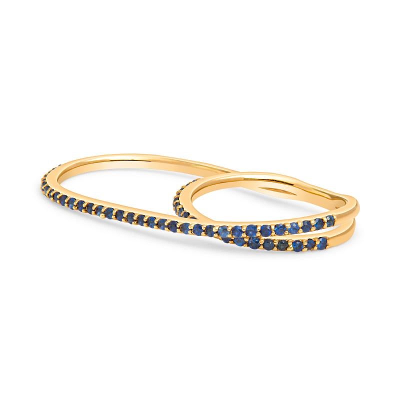 This beautiful custom made multi finger ring features 0.90 carat total weight in blue sapphires set in 18 karat yellow gold. 

This ring is modernistic, sleek and very versatile. You could were it on your index finger and middle finger or your ring