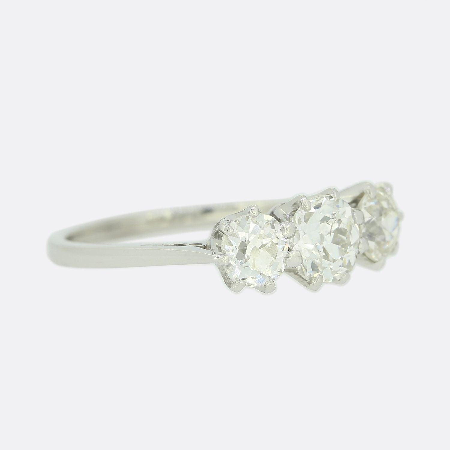 Old Mine Cut 0.90 Carat Old Cut Diamond Three Stone Ring For Sale