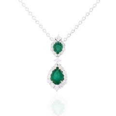 0.90 Carat Pear Shape Emerald Pendant with 0.70 ct Diamond Halo in 18W/Y ref1312