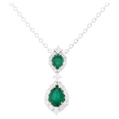 0.90 Carat Pear Shape Emerald Pendant with 0.70 ct Diamond Halo in 18W/Y ref1312