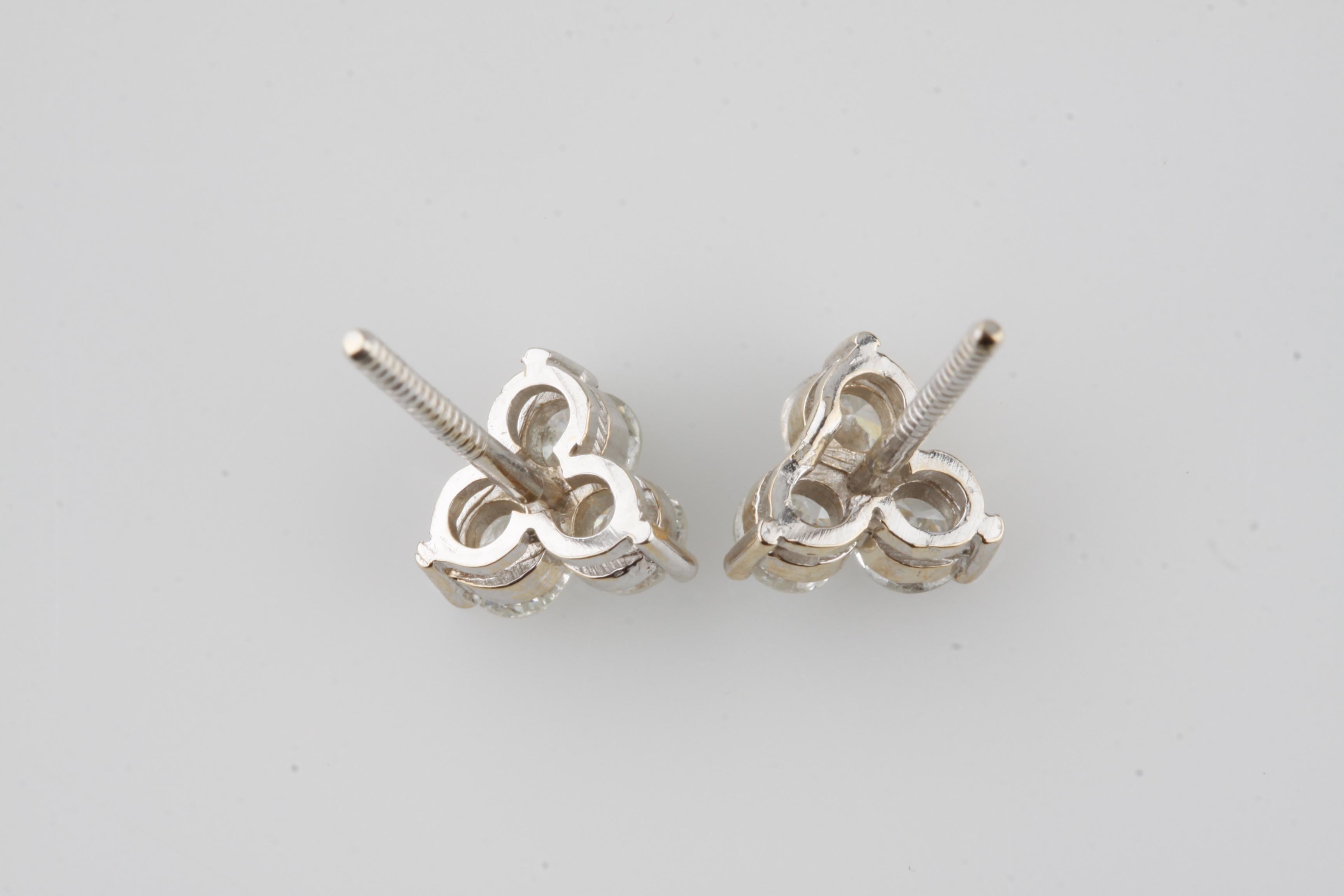 set of three stud earrings