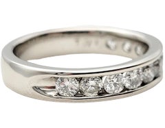 Channel Set Round Diamond Semi-Eternity Band Ring in Polished Platinum