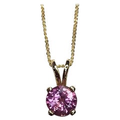 0.90 Carat Unheated Vivid Pink Sapphire 18 Karat Gold Round Diamond Cut Pendant