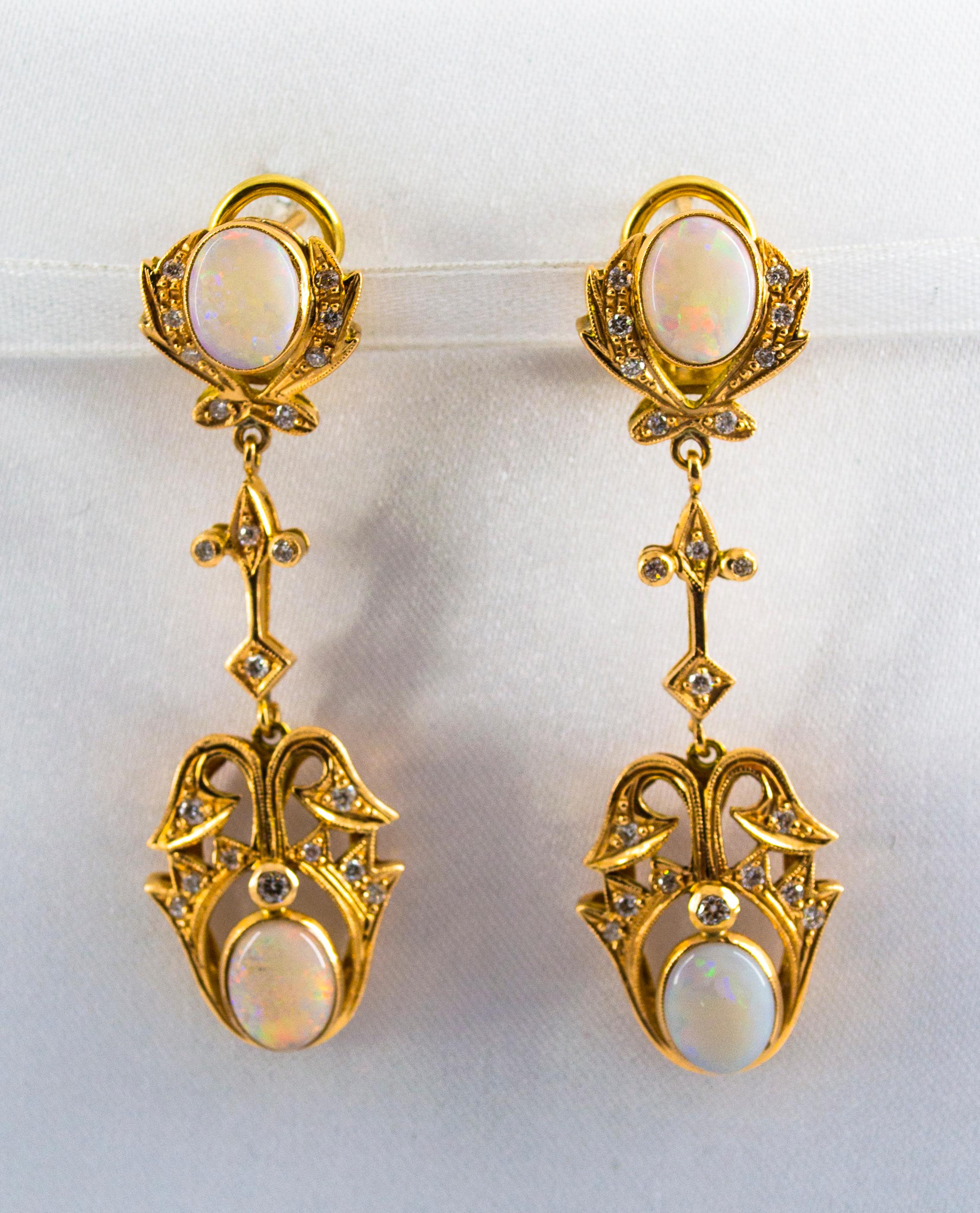 These Earrings are made of 14K Yellow Gold.
These Earrings have 0.90 Carats of White Diamonds.
These Earrings have 3.90 Carats of Opals.
We're a workshop so every piece is handmade, customizable and resizable.