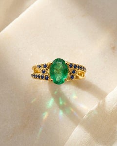 0.90 Carat Zambian Emerald Solitaire Ring Blue Sapphire Accents in 14K Gold