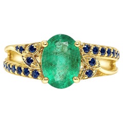 0.90 Carat Zambian Emerald Solitaire Ring Blue Sapphire Accents in 14K Gold