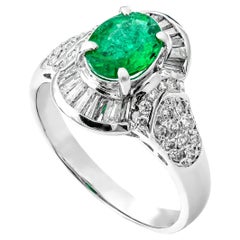 0.90 Ct Natural Emerald and 0.63 Ct Natural White Diamonds Ring