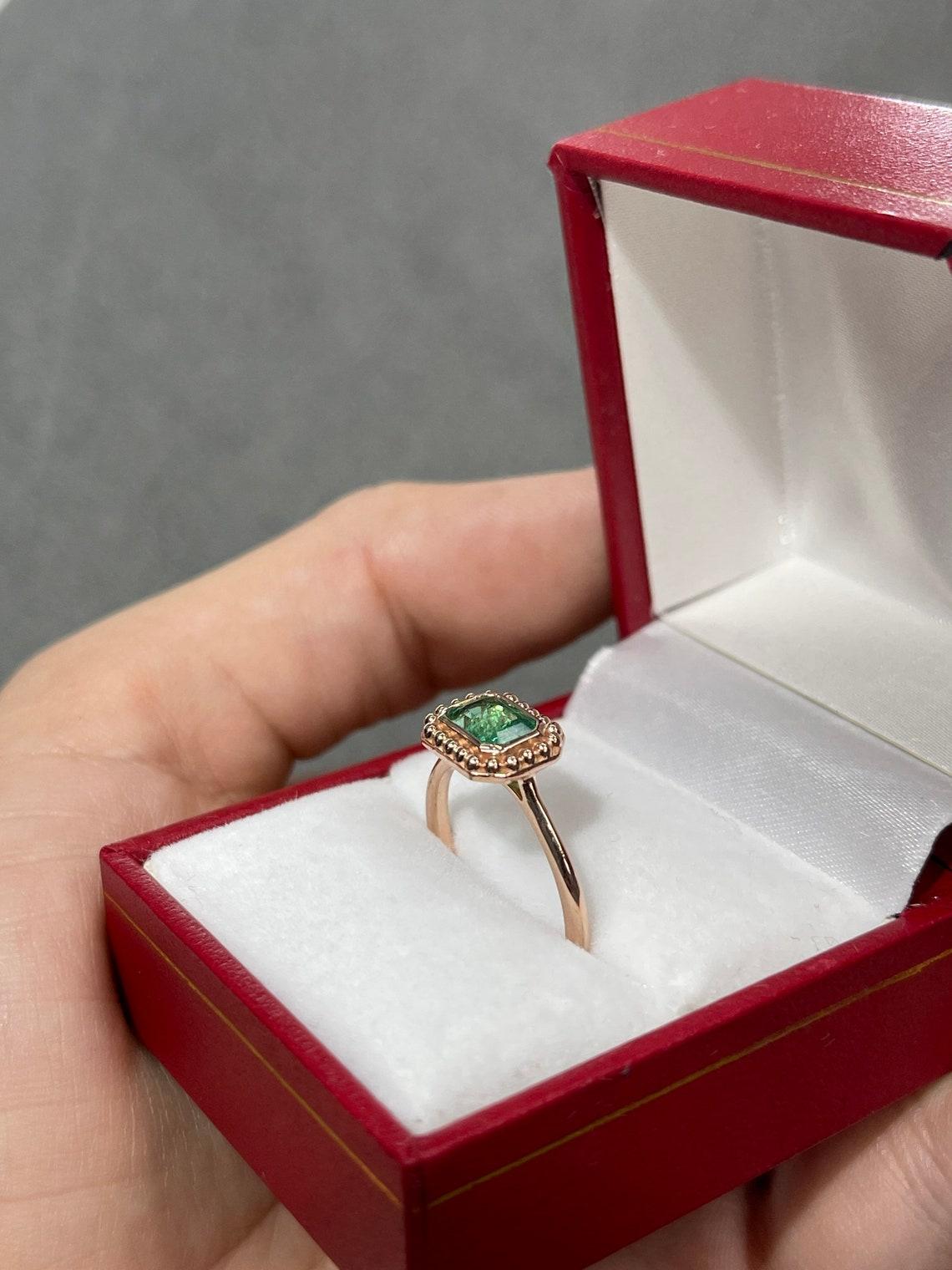 emerald bezel ring