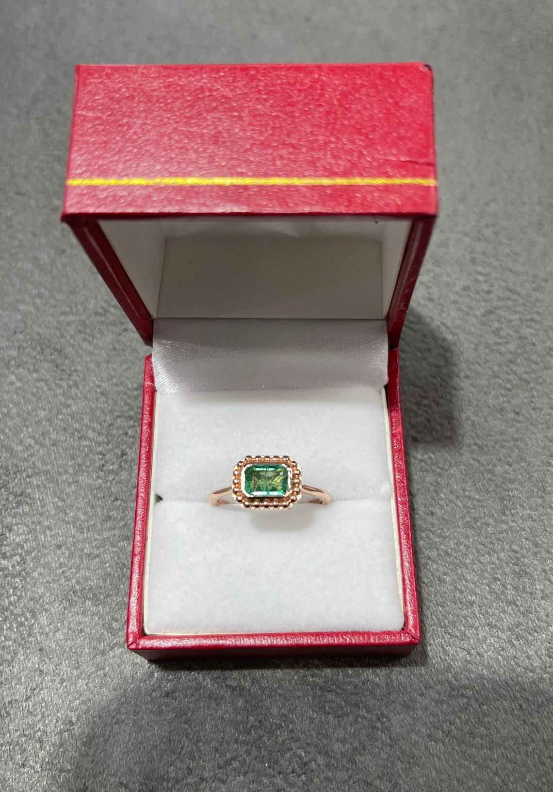 emerald cut emerald ring gold band