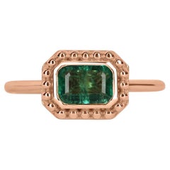 Used 0.90ct 14K Bezel Set Emerald Cut Emerald Solitaire Rose Gold Bead Ring