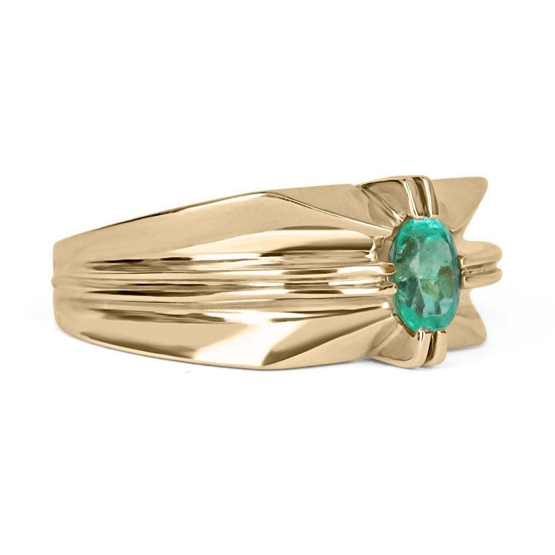 Setting Style: Bezel Solitaire
Metal Purity: 14K Yellow Gold
Weight: 11.5 Grams

Main Stone: Emerald
Shape: Oval Cut
Approx Estimated Weight: 0.90-carats
Clarity: Transparent
Color: Green
Luster: Excellent-Very Good
Treatment: Natural
Origin: