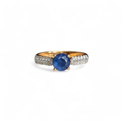 0.90Ct blue sapphire and natural diamond ring in 18k solid gold