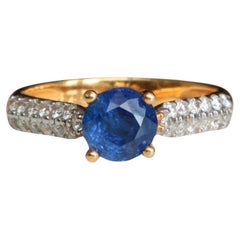 0.90Ct blue sapphire and natural diamond ring in 18k solid gold