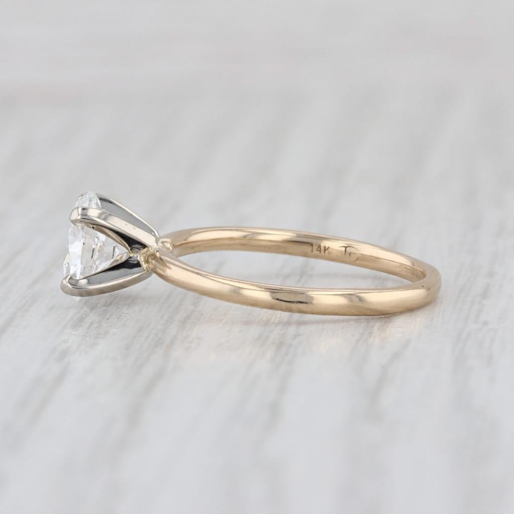 Gemstone Information:
- Natural Diamond -
Carats - 0.90ct 
Cut - Oval Brilliant
Color - D
Clarity - SI1
GIA - 6452852354

Metal: 14k White 
Yellow Gold
Weight: 2.1 Grams 
Stamps: 14k
Face Height: 7.2 mm 
Rise Above Finger: 7.1 mm
Band / Shank